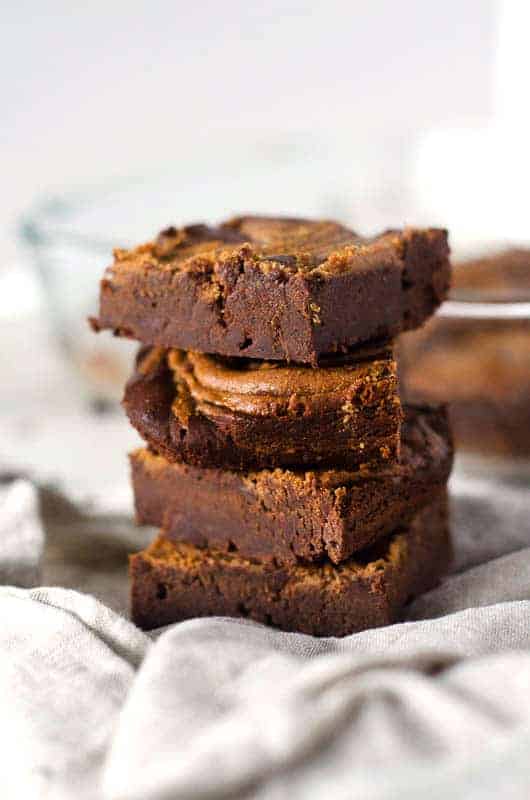 four brownies stacked tall, viewed from the side