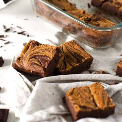 cut up brownies with pan in background