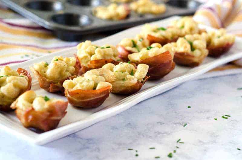 side view of mac and cheese bites on a platter