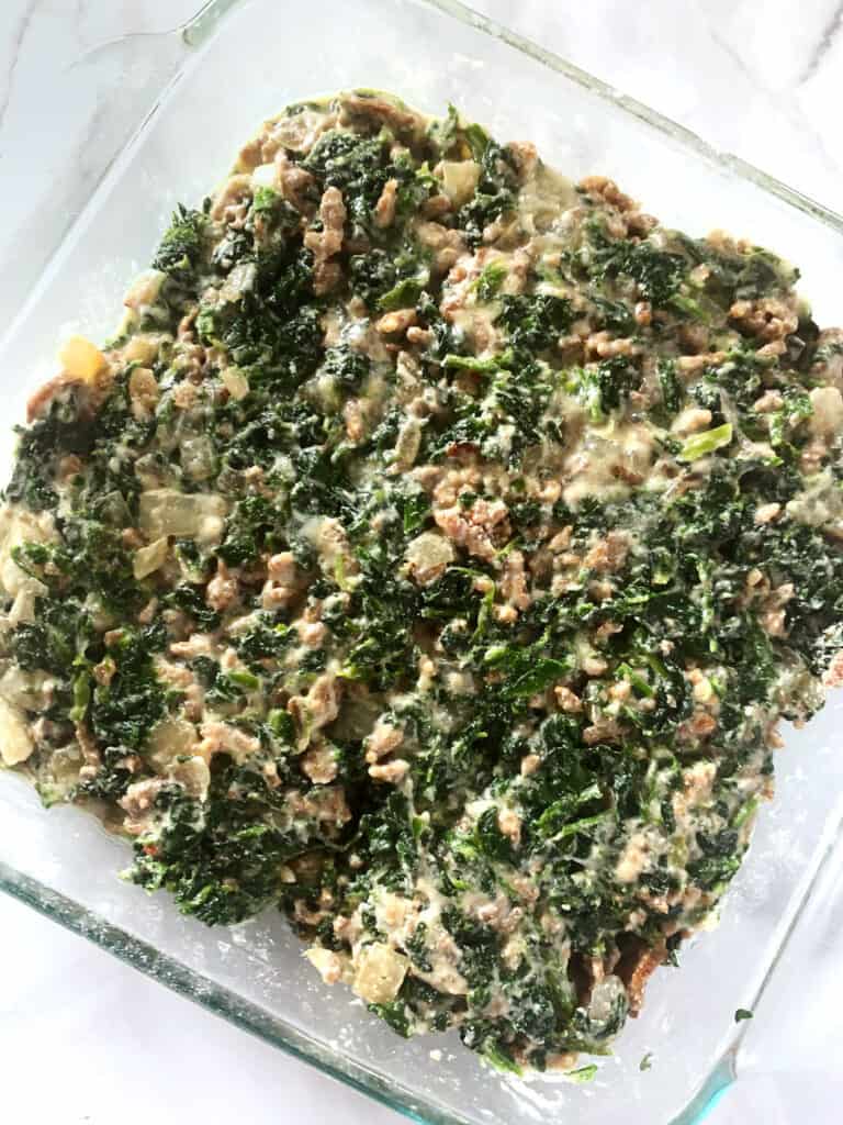 Overhead view of spinach egg casserole before baking