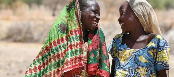 mauve-group-chad-two-women-smiling.jpg