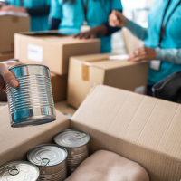 ngo workers packing aid boxes